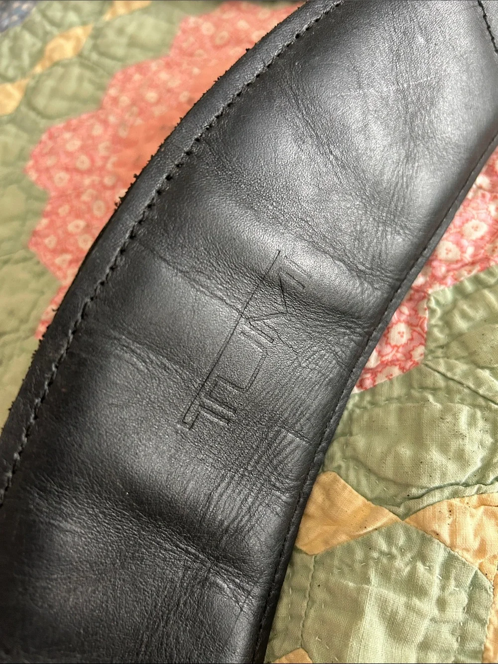 Tumi leather luggage